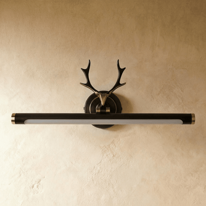 Modern Leios wall lamp by Residence Supply featuring a sleek metal design and adjustable arm, mounted on a neutral wall.