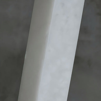 Lifang table lamp by Residence Supply featuring a sleek design with a white shade and wooden base on a modern desk.