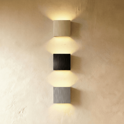 Modern Lior Wall Lamp by Residence Supply featuring sleek design, mounted on a wall with warm ambient lighting.