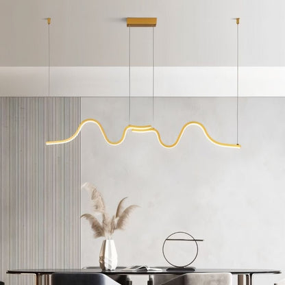 Gold wave pendant light from Residence Supply featuring a sleek, modern design with flowing, wave-inspired shape for stylish illumination.