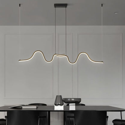 Lissar Wave Pendant Light by Residence Supply hanging fixture with a modern, wave-shaped design in a sleek metallic finish