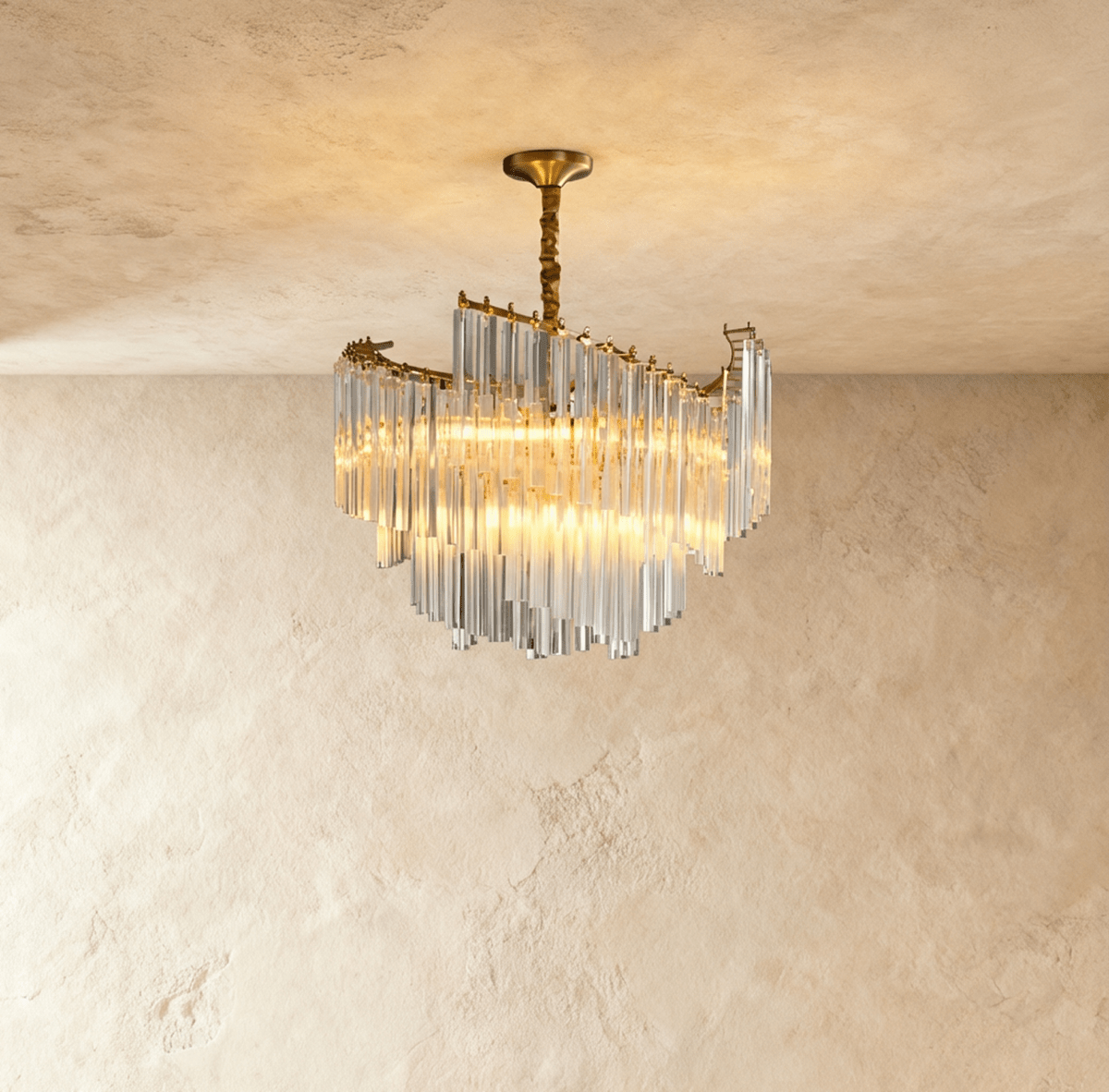 Elegant Livok chandelier with multiple glass globes and brass accents, hanging from a decorative ceiling mount.