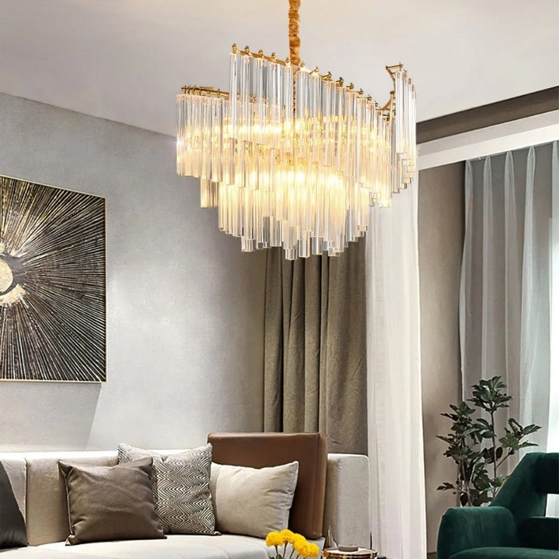 Livok layered crystal chandelier by Residence Supply hanging in a living room, featuring multiple crystal tiers and elegant lighting design.