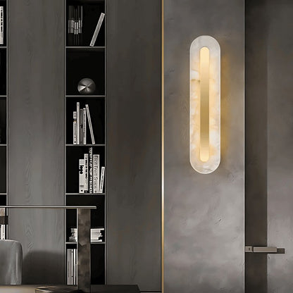Modern Lofos Wall Lamp by Residence Supply featuring alabaster glass and brass finish for stylish interior lighting.