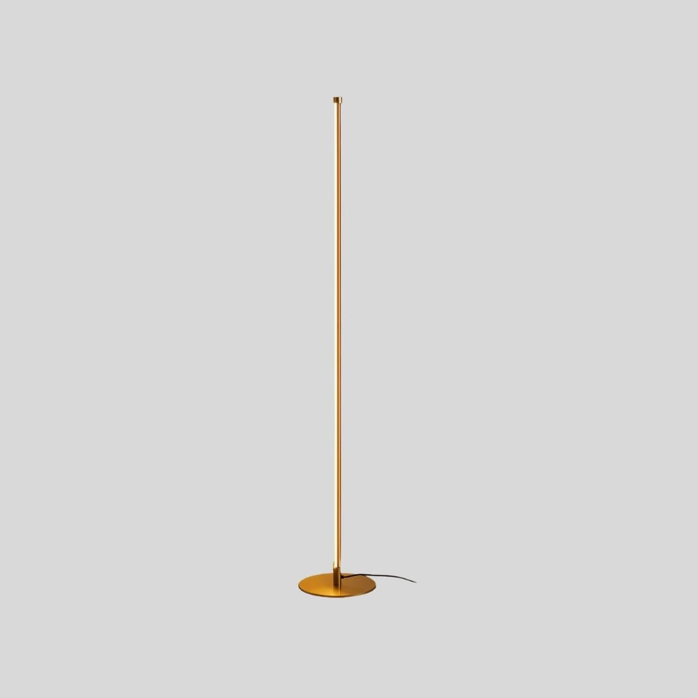 Residence Supply Lotif floor lamp with a sleek, modern design and a tall, cylindrical shade standing on a sturdy base.