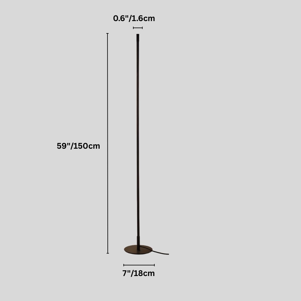 Modern Lotif Floor Lamp by Residence Supply with a sleek design and tall, adjustable metal stand in a contemporary living space.