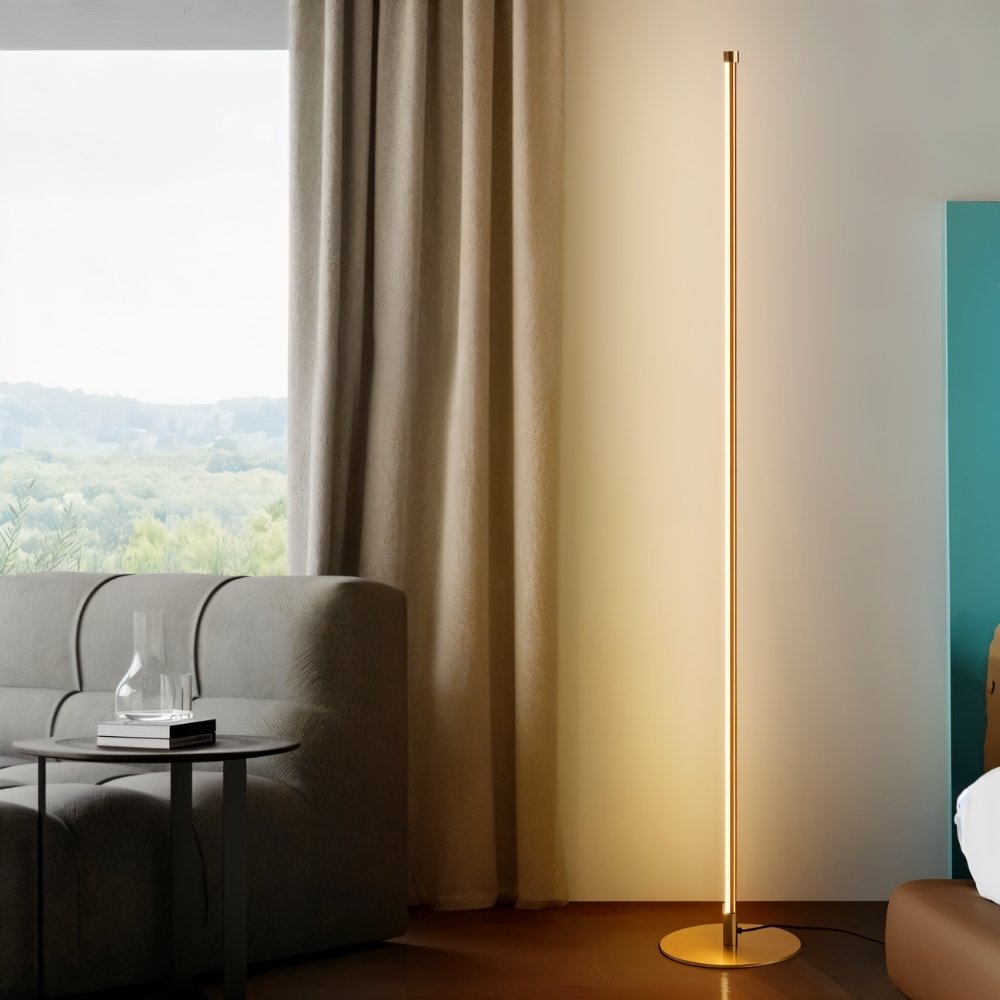 Residue Supply Lotif floor lamp with a sleek, modern design featuring a tall stand and a stylish lampshade for living room lighting.