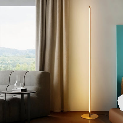 Residue Supply Lotif floor lamp with a sleek, modern design featuring a tall stand and a stylish lampshade for living room lighting.
