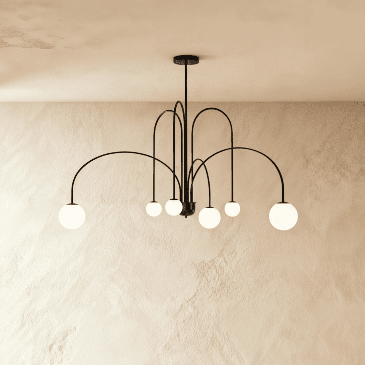 Elegant Lucille Chandelier by Residence Supply featuring multiple glass globes and a sleek metal frame for modern lighting.