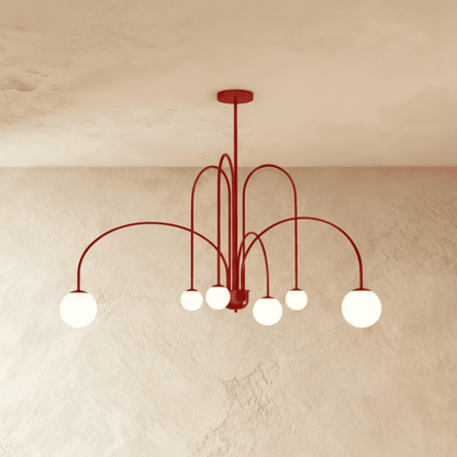 Elegant Lucille Chandelier by Residence Supply featuring multiple glass globes and a sleek metal frame for stylish illumination.