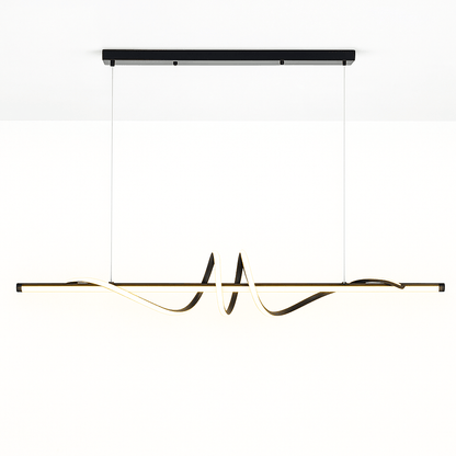 Lumexis pendant light by Residence Supply featuring a sleek modern design with a metallic finish and adjustable hanging cord.