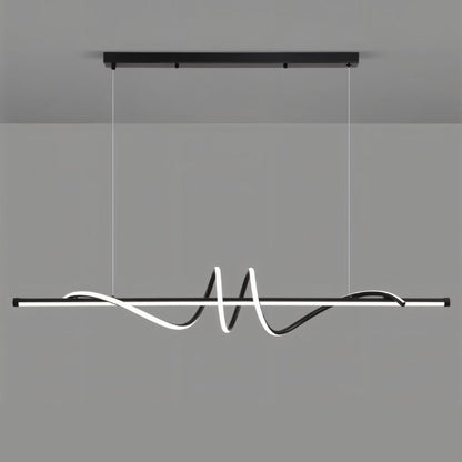Black Lumexis Pendant Light by Residence Supply hanging from ceiling with modern design and sleek finish.
