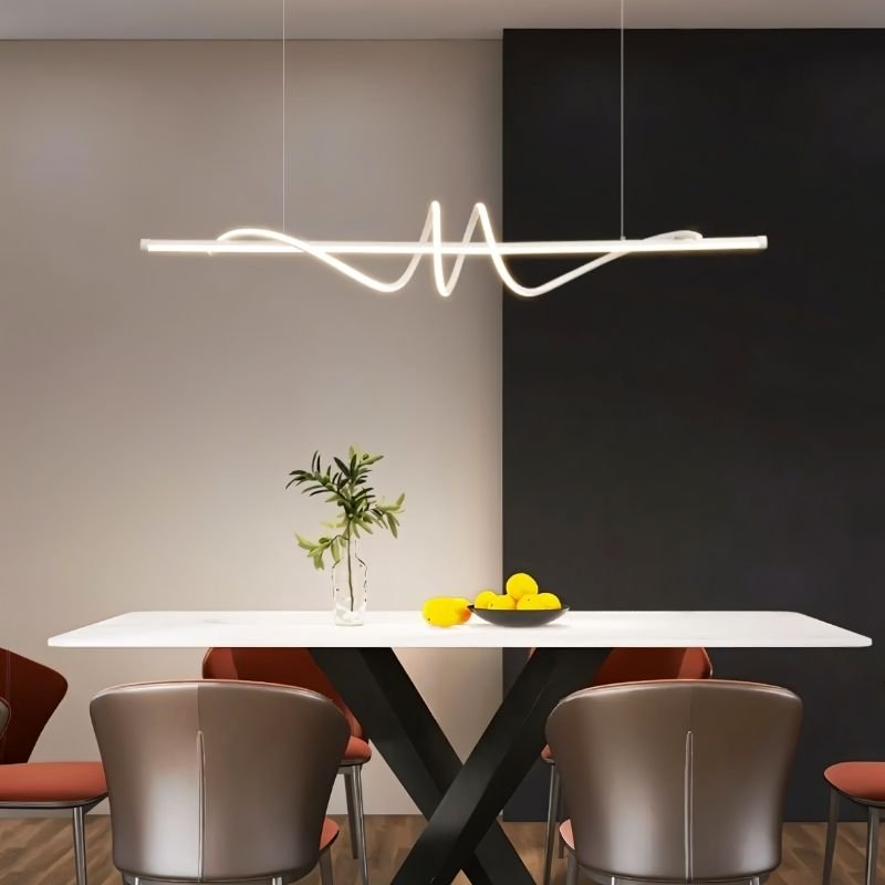 Lumexis Pendant Light in dining room with modern design and sleek finish, providing stylish illumination.