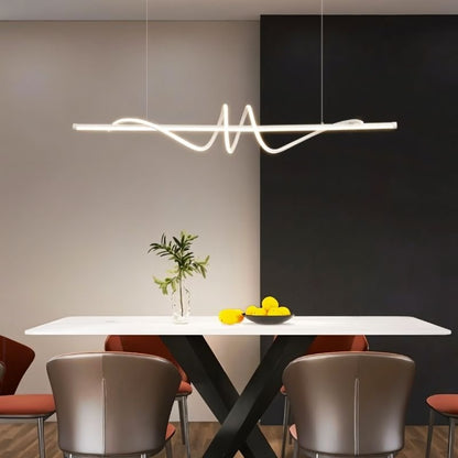 Lumexis Pendant Light in dining room with modern design and sleek finish, providing stylish illumination.