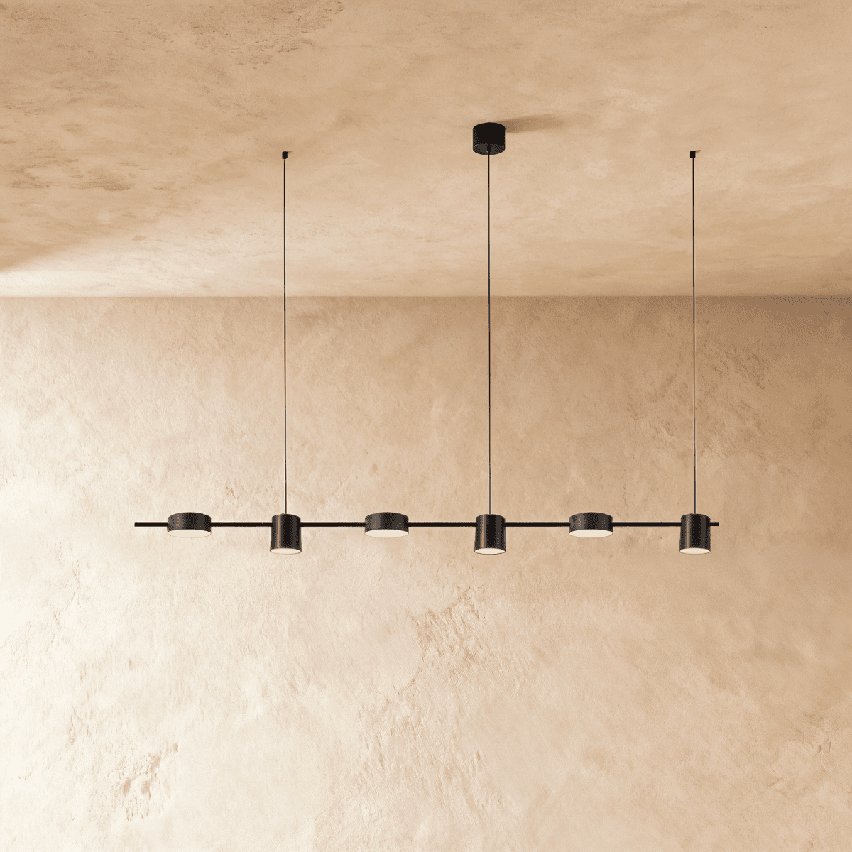 Elegant Lumina Luxe Chandelier by Residence Supply with crystal accents and a modern silver finish, hanging in a stylish living room.