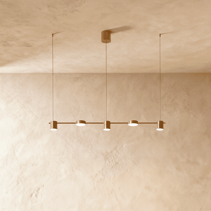 Elegant Lumina Luxe Chandelier by Residence Supply featuring crystal accents and a modern gold finish inside a stylish living room.
