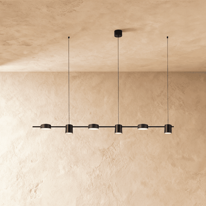 Elegant Lumina Luxe Chandelier by Residence Supply with crystal accents and a modern design, hanging from a ceiling fixture.