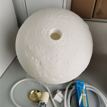 Residence Supply lunar pendant light hanging fixture with a sleek, modern design for stylish interior lighting.