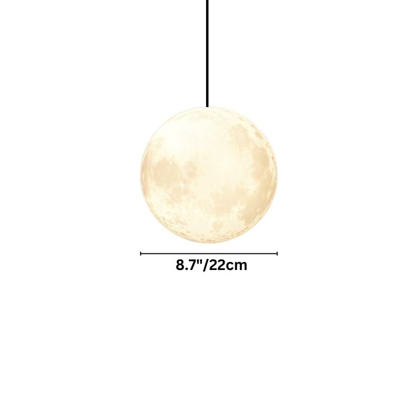 Residence Supply lunar pendant light with a sleek, modern design featuring a spherical shape and warm ambient lighting.