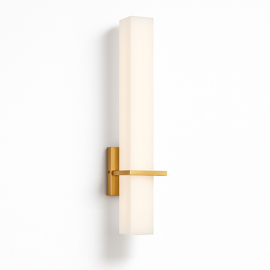 Modern Lunara Wall Lamp by Residence Supply mounted on a wall with a sleek design and warm lighting.