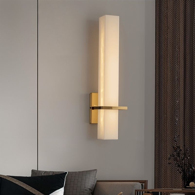 Lunara wall lamp by Residence Supply featuring alabaster shade and brass fixture, ideal for bedroom lighting.