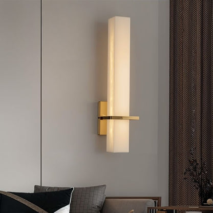 Lunara wall lamp by Residence Supply featuring alabaster shade and brass fixture, ideal for bedroom lighting.