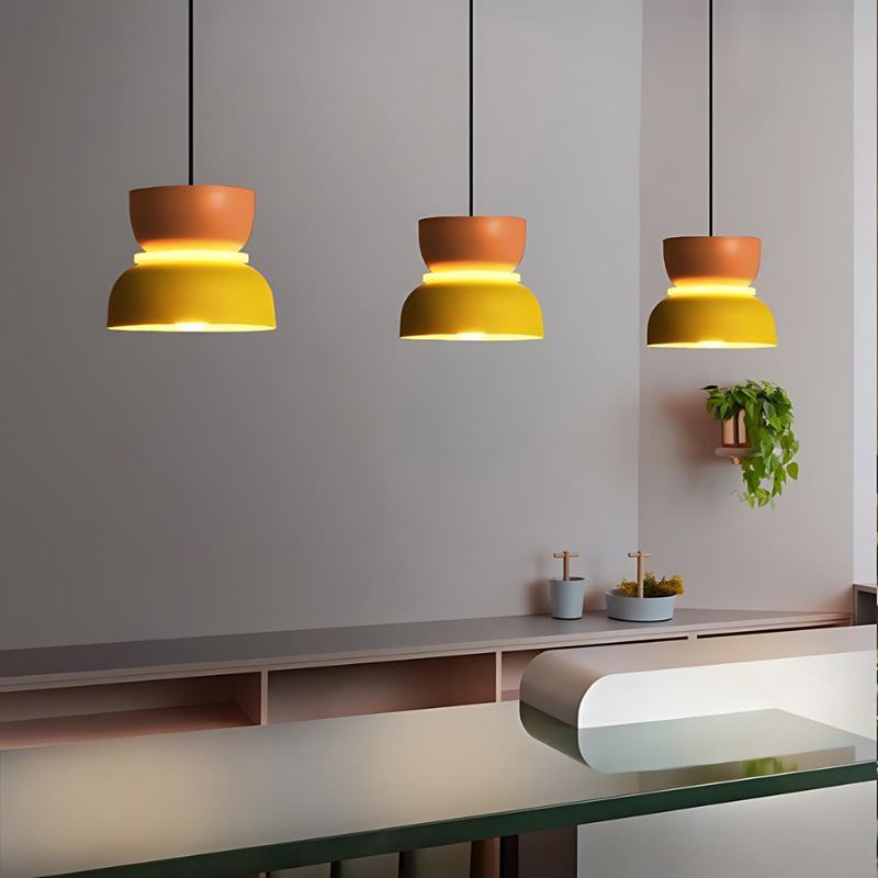 Residence Supply Macaron Pendant Light hanging fixture with pastel-colored, round-shaped design for modern interior decor.
