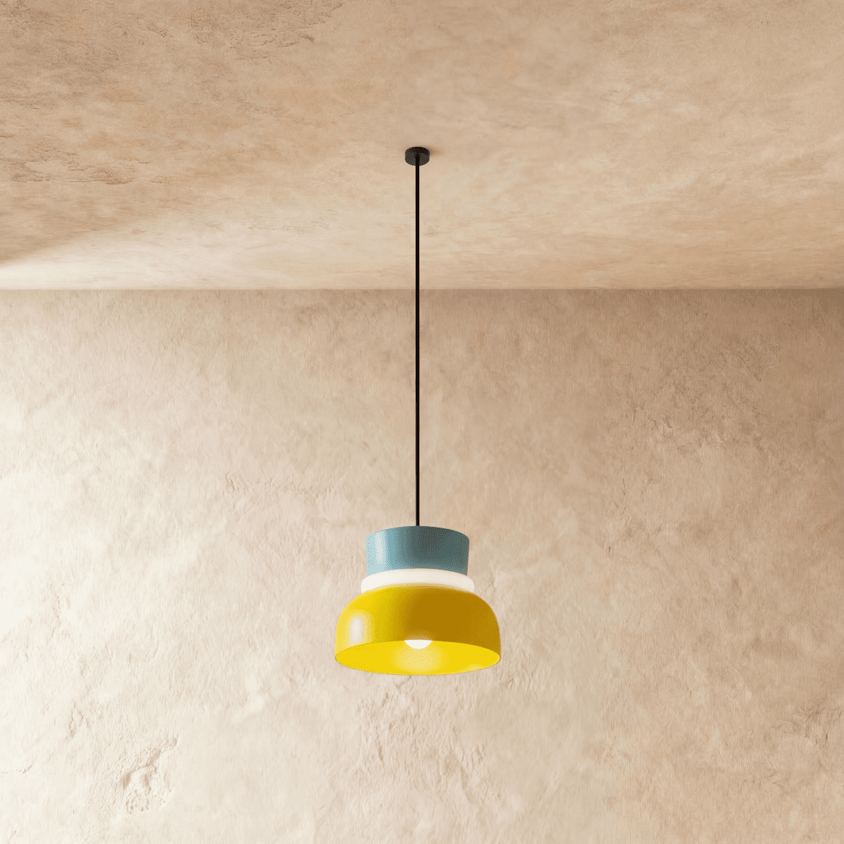 Residence Supply Macaron Pendant Light with pastel-colored, round ceramic shade hanging from a sleek metal fixture.
