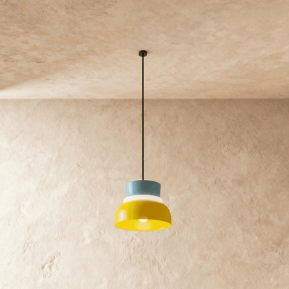 Residence Supply Macaron Pendant Light with pastel-colored, round ceramic shade hanging from a sleek metal fixture.