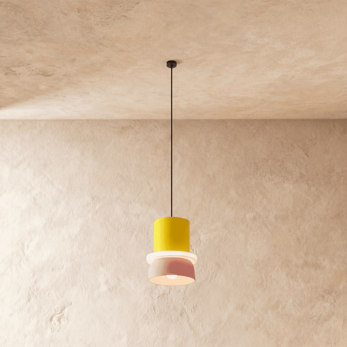 Residence Supply Macaron Pendant Light showcasing a pastel-colored, round ceramic design hanging from a metal fixture.