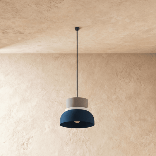Residence Supply Macaron Pendant Light with pastel-colored, round ceramic shades hanging from a sleek ceiling mount.