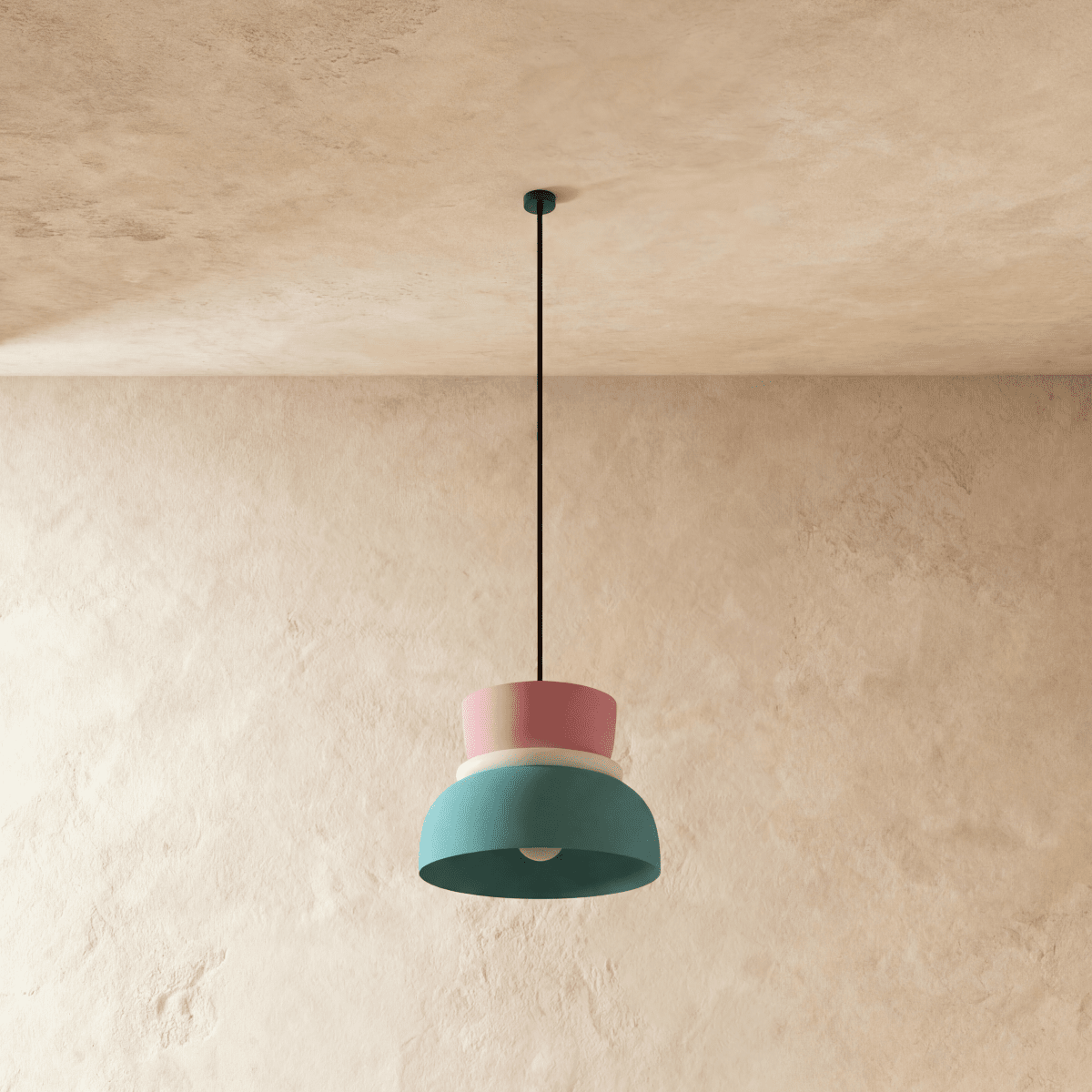 Residence Supply Macaron Pendant Light with pastel-colored, rounded glass shade hanging from a sleek metal fixture.