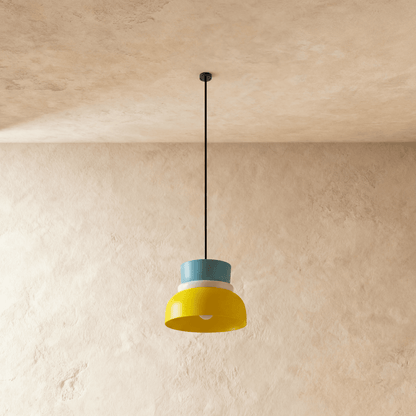 Residence Supply Macaron Pendant Light with pastel-colored, rounded ceramic shade hanging from a ceiling mount.