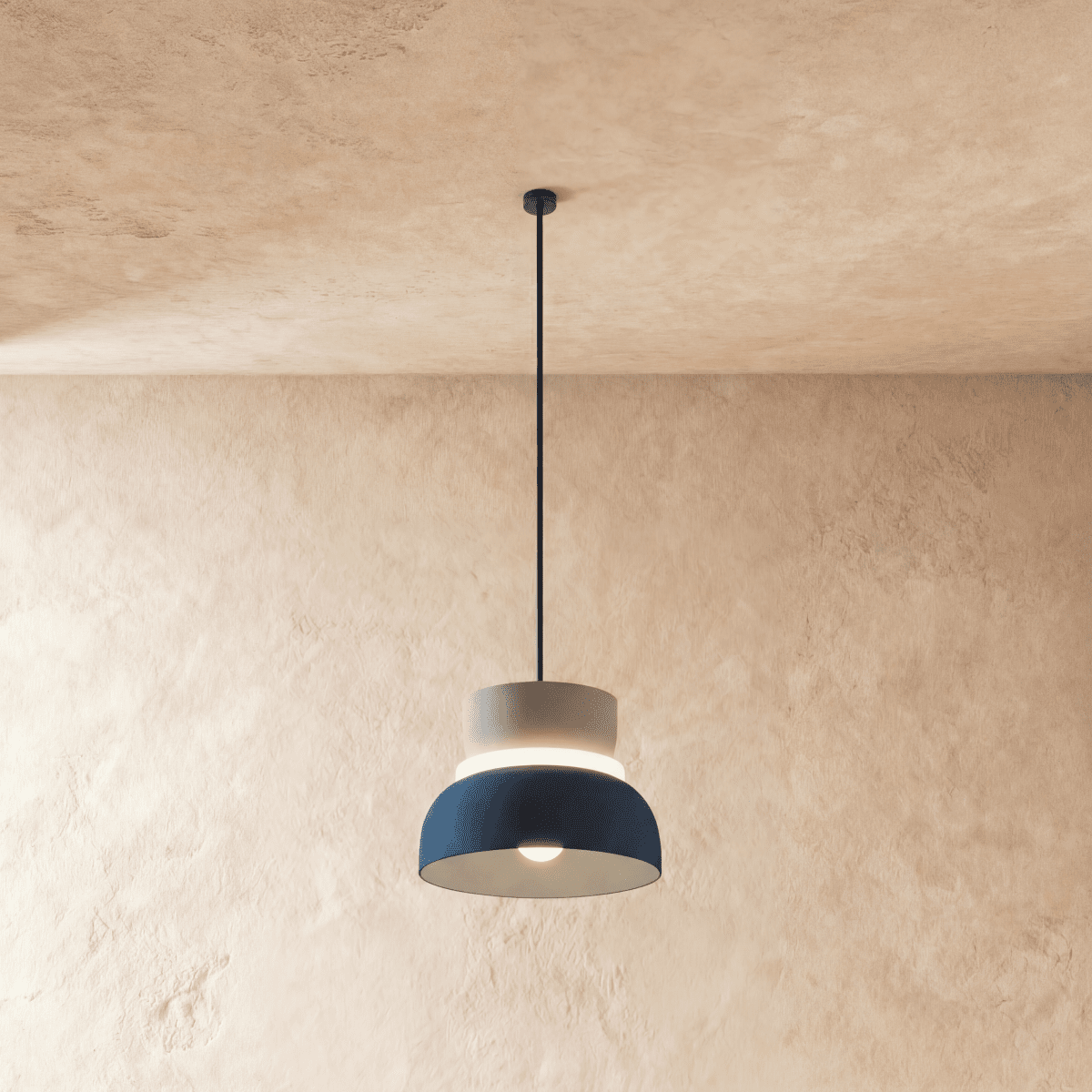 Residence Supply Macaron Pendant Light with pastel-colored, rounded ceramic shade hanging from a sleek metal fixture.