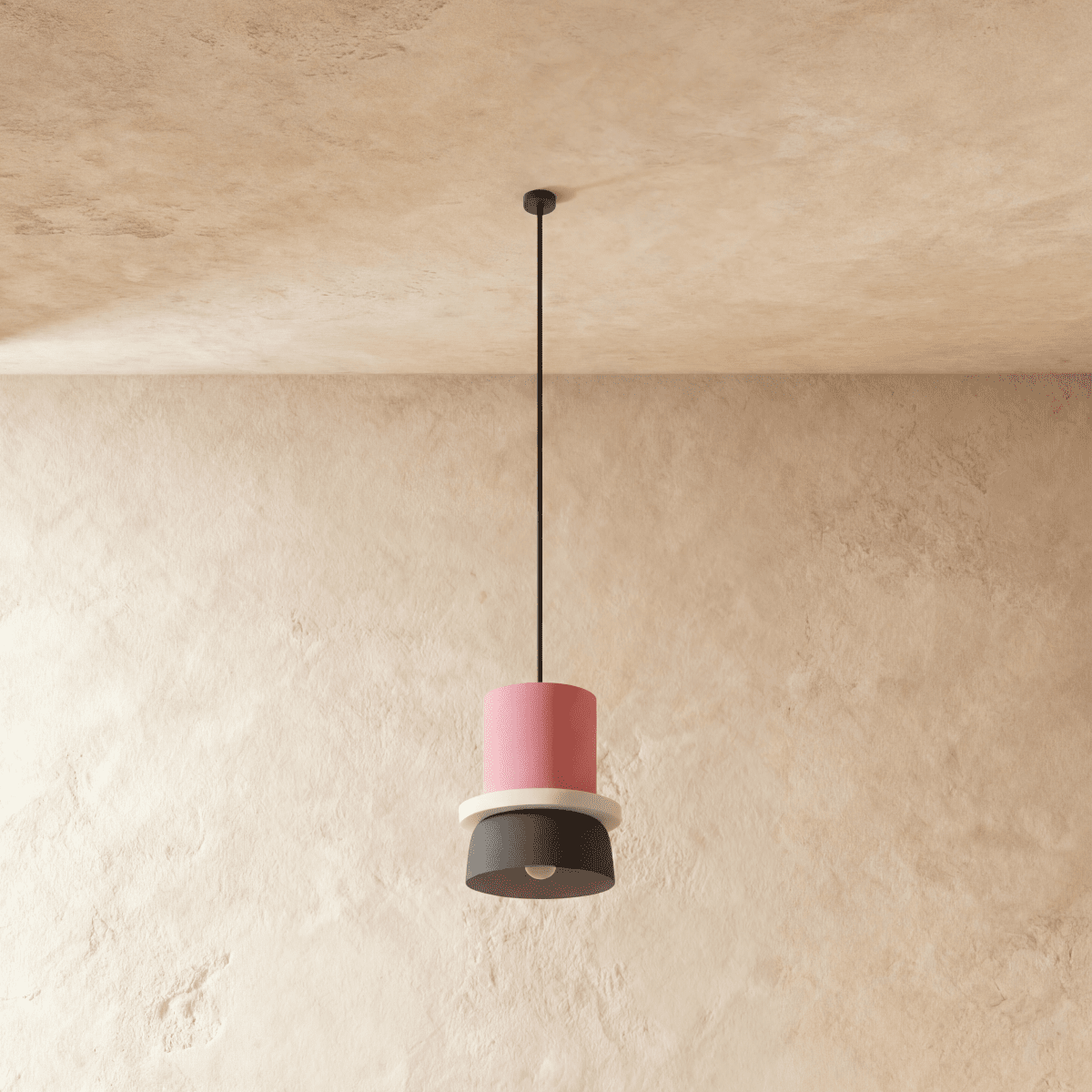 Residence Supply Macaron Pendant Light featuring a pastel-colored, round ceramic shade hanging from a sleek metal fixture.