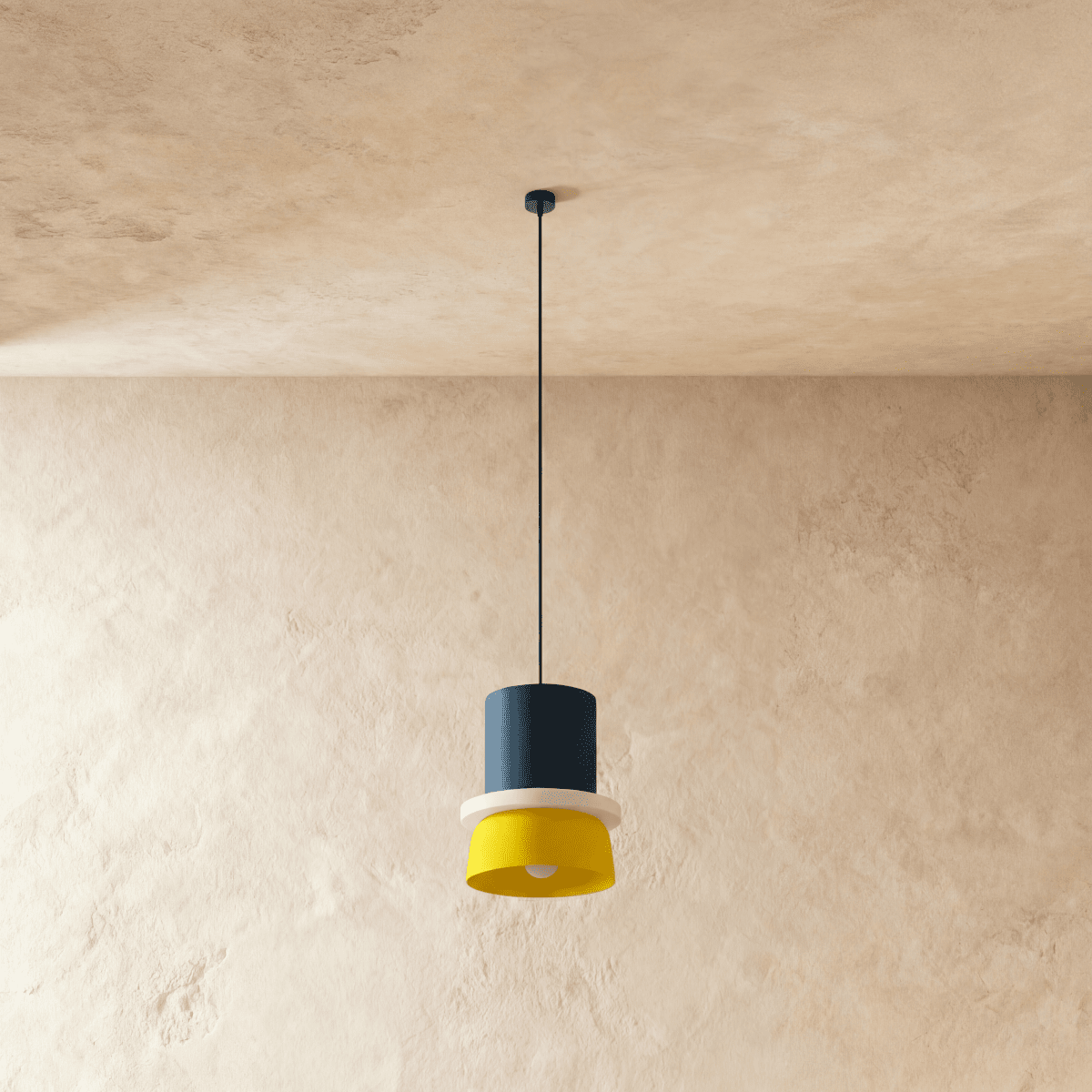 Residence Supply macaron pendant light with pastel-colored, rounded ceramic shade hanging from a ceiling mount.