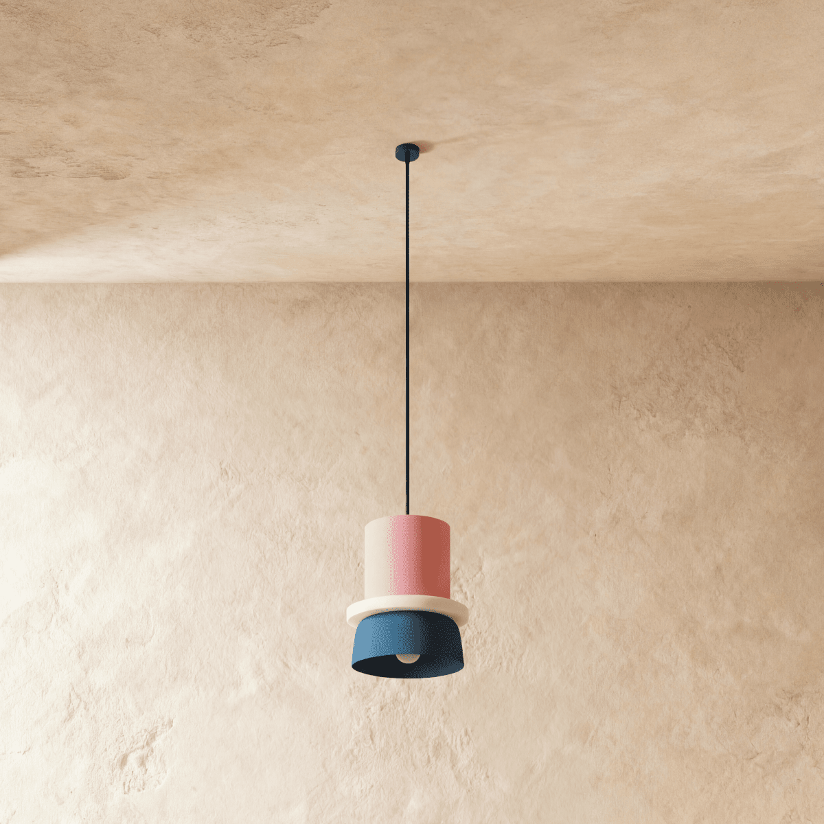 Residence Supply Macaron Pendant Light with pastel-colored ceramic shade hanging from a metal fixture.