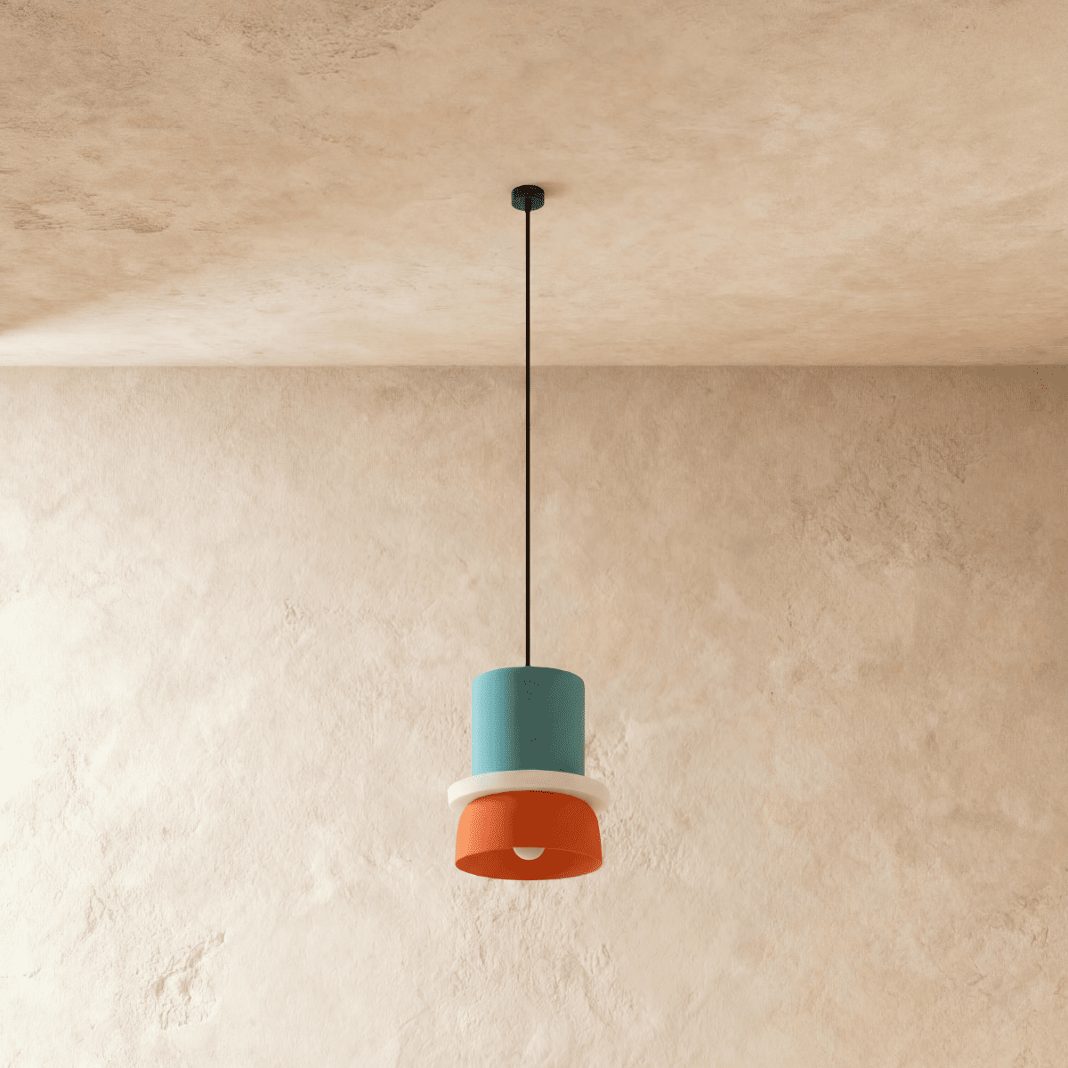 Residence Supply Macaron Pendant Light with pastel-colored, rounded ceramic shade hanging from a ceiling mount.