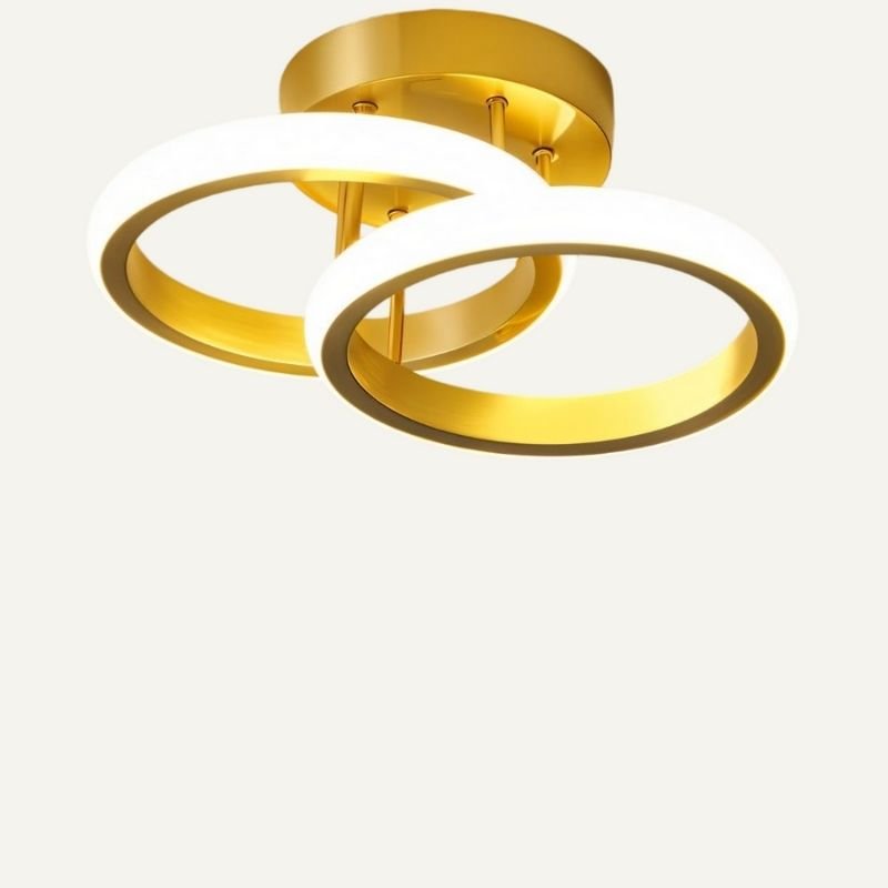 Manaia Ceiling Light by Residence Supply featuring a modern design with intricate metalwork and warm ambient lighting.