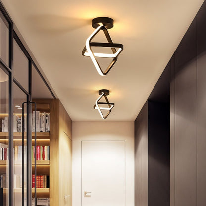 Manaia ceiling light by Residence Supply featuring a decorative metal design and warm ambient lighting for modern interiors.