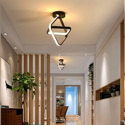 Residence Supply Manaia ceiling light fixture with decorative metal design and warm ambient lighting.