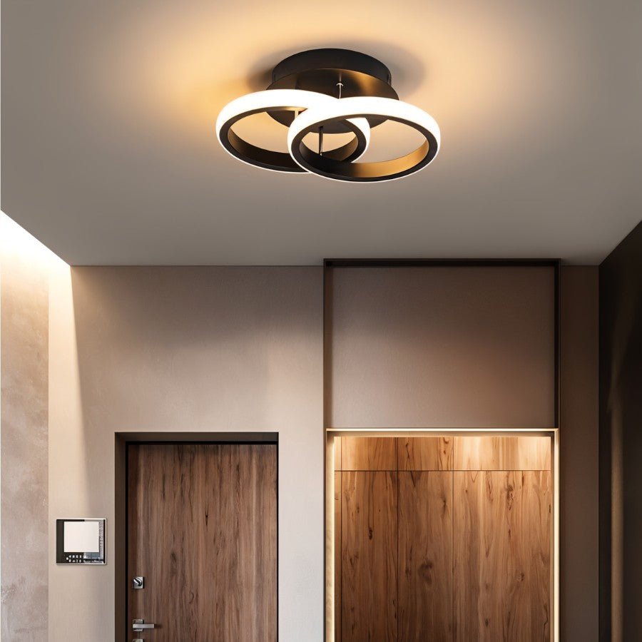Elegant Manaia ceiling light by Residence Supply featuring intricate metal design and warm ambient lighting.