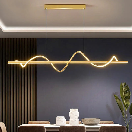 Elegant Margot Pendant Light by Residence Supply with a sleek metal finish and modern design, hanging from the ceiling.