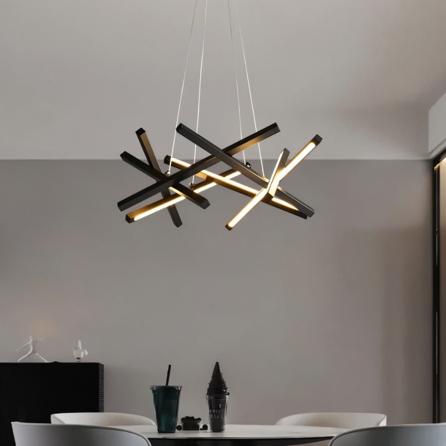 Elegant Maseu Chandelier by Residence Supply with multiple glass bulbs and intricate metal frame, hanging from a ceiling.