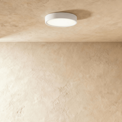 Residence Supply Melor Downlight showing a sleek, modern LED ceiling light fixture with a round white trim.