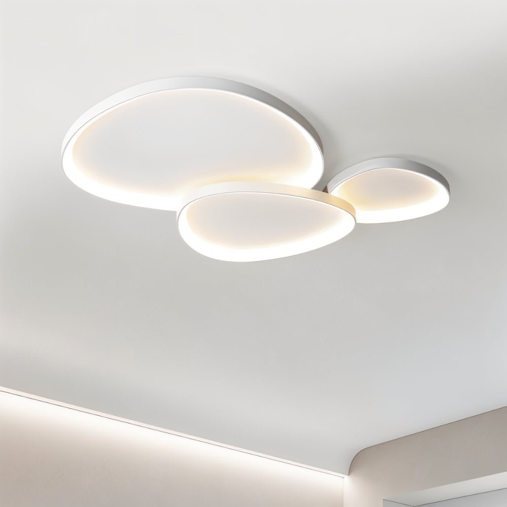 Modern Mila Ceiling Light by Residence Supply with sleek design and soft ambient lighting, ideal for living rooms or bedrooms.