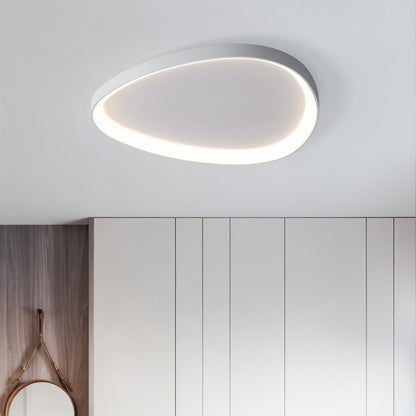 Modern Mila ceiling light by Residence Supply with sleek design and soft white illumination for living rooms and bedrooms.