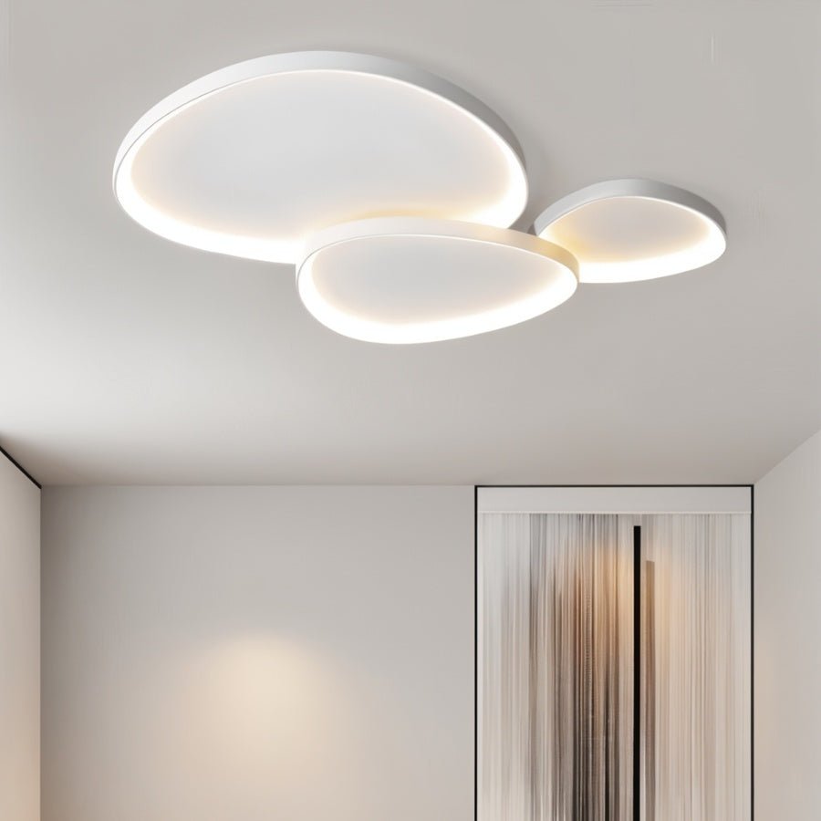 Modern Mila Ceiling Light by Residence Supply featuring a sleek design and warm illumination for contemporary interiors.