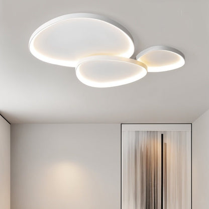 Modern Mila Ceiling Light by Residence Supply featuring a sleek design and warm illumination for contemporary interiors.