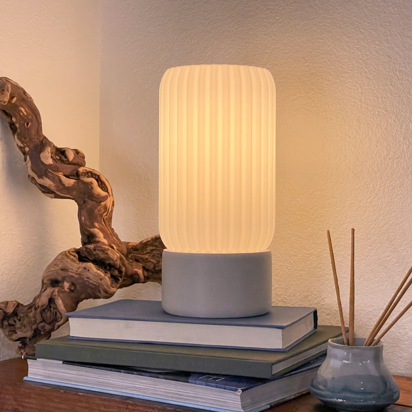 Terra Labs Milk Shade Barrel Table Lamp with a smooth, milk-colored shade and a sturdy base, perfect for modern home decor.